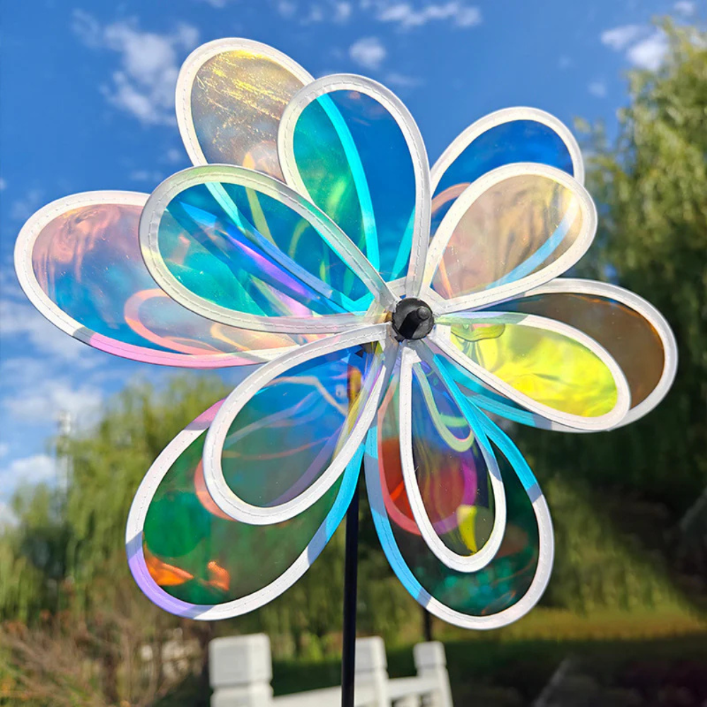 Wikz Twista Flower Spectrum Six vindhjul i regnbuefarver, vist i natur